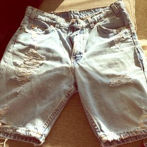 Levi light washed destroyed denim boy shorts